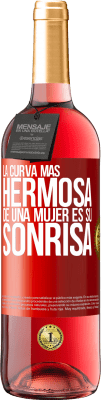 29,95 € Envío gratis | Vino Rosado Edición ROSÉ La curva más hermosa de una mujer es su sonrisa Etiqueta Roja. Etiqueta personalizable Vino joven Cosecha 2025 Tempranillo