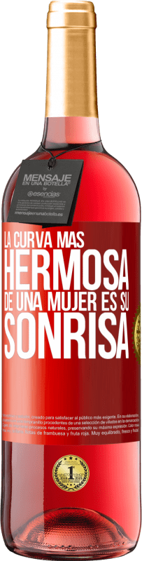 29,95 € Envío gratis | Vino Rosado Edición ROSÉ La curva más hermosa de una mujer es su sonrisa Etiqueta Roja. Etiqueta personalizable Vino joven Cosecha 2024 Tempranillo