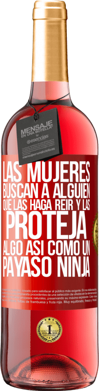 29,95 € Envío gratis | Vino Rosado Edición ROSÉ Las mujeres buscan a alguien que las haga reír y las proteja, algo así como un payaso ninja Etiqueta Roja. Etiqueta personalizable Vino joven Cosecha 2023 Tempranillo