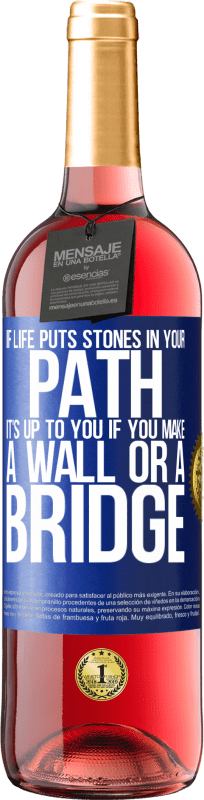 29,95 € Free Shipping | Rosé Wine ROSÉ Edition If life puts stones in your path, it's up to you if you make a wall or a bridge Blue Label. Customizable label Young wine Harvest 2023 Tempranillo