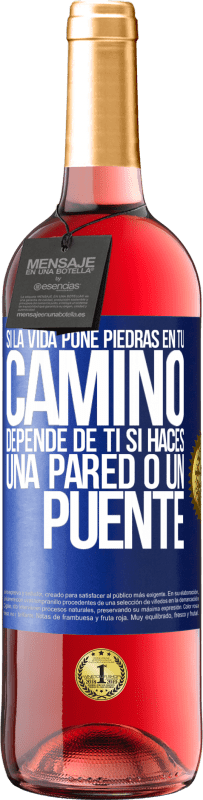 29,95 € Envío gratis | Vino Rosado Edición ROSÉ Si la vida pone piedras en tu camino, depende de ti si haces una pared o un puente Etiqueta Azul. Etiqueta personalizable Vino joven Cosecha 2024 Tempranillo