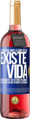 29,95 € Envío gratis | Vino Rosado Edición ROSÉ La prueba más clara de que existe vida inteligente en otros planetas es que aún no han venido a visitarnos Etiqueta Azul. Etiqueta personalizable Vino joven Cosecha 2023 Tempranillo