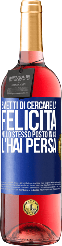 29,95 € Spedizione Gratuita | Vino rosato Edizione ROSÉ Smetti di cercare la felicità nello stesso posto in cui l'hai persa Etichetta Blu. Etichetta personalizzabile Vino giovane Raccogliere 2024 Tempranillo