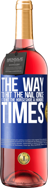 29,95 € Free Shipping | Rosé Wine ROSÉ Edition The way to hit the nail once is to hit the horseshoe a hundred times Blue Label. Customizable label Young wine Harvest 2023 Tempranillo
