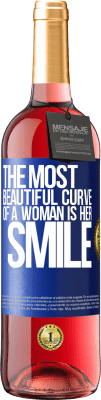 29,95 € Free Shipping | Rosé Wine ROSÉ Edition The most beautiful curve of a woman is her smile Blue Label. Customizable label Young wine Harvest 2023 Tempranillo