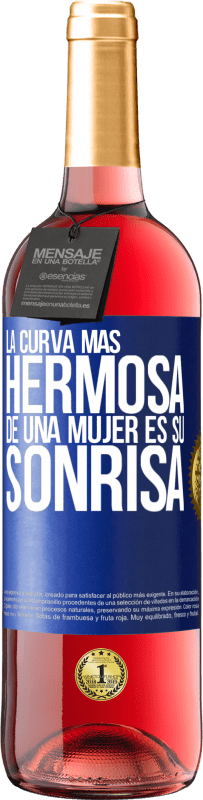 29,95 € Envío gratis | Vino Rosado Edición ROSÉ La curva más hermosa de una mujer es su sonrisa Etiqueta Azul. Etiqueta personalizable Vino joven Cosecha 2024 Tempranillo