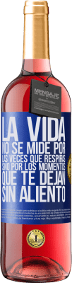 29,95 € Envío gratis | Vino Rosado Edición ROSÉ La vida no se mide por las veces que respiras sino por los momentos que te dejan sin aliento Etiqueta Azul. Etiqueta personalizable Vino joven Cosecha 2023 Tempranillo