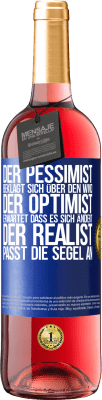 29,95 € Kostenloser Versand | Roséwein ROSÉ Ausgabe Der Pessimist beklagt sich über den Wind, der Optimist erwartet, dass es sich ändert, der Realist passt die Segel an Blaue Markierung. Anpassbares Etikett Junger Wein Ernte 2023 Tempranillo