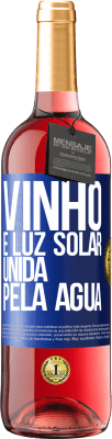 29,95 € Envio grátis | Vinho rosé Edição ROSÉ Vinho é luz solar, unida pela água Etiqueta Azul. Etiqueta personalizável Vinho jovem Colheita 2023 Tempranillo