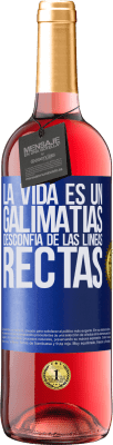29,95 € Envío gratis | Vino Rosado Edición ROSÉ La vida es un galimatías, desconfía de las líneas rectas Etiqueta Azul. Etiqueta personalizable Vino joven Cosecha 2025 Tempranillo