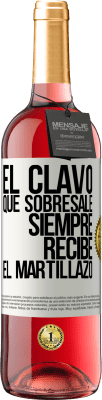 29,95 € Envío gratis | Vino Rosado Edición ROSÉ El clavo que sobresale siempre recibe el martillazo Etiqueta Blanca. Etiqueta personalizable Vino joven Cosecha 2025 Tempranillo