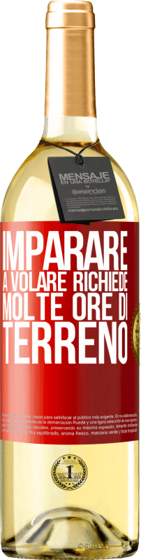 29,95 € Spedizione Gratuita | Vino bianco Edizione WHITE Imparare a volare richiede molte ore di terreno Etichetta Rossa. Etichetta personalizzabile Vino giovane Raccogliere 2024 Verdejo