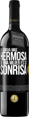 39,95 € Envío gratis | Vino Tinto Edición RED MBE Reserva La curva más hermosa de una mujer es su sonrisa Etiqueta Negra. Etiqueta personalizable Reserva 12 Meses Cosecha 2014 Tempranillo