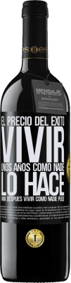 39,95 € Envío gratis | Vino Tinto Edición RED MBE Reserva El precio del éxito. Vivir unos años como nadie lo hace, para después vivir como nadie puede Etiqueta Negra. Etiqueta personalizable Reserva 12 Meses Cosecha 2014 Tempranillo