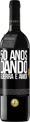 39,95 € Envio grátis | Vinho tinto Edição RED MBE Reserva 50 anos dando guerra e amor Etiqueta Preta. Etiqueta personalizável Reserva 12 Meses Colheita 2015 Tempranillo