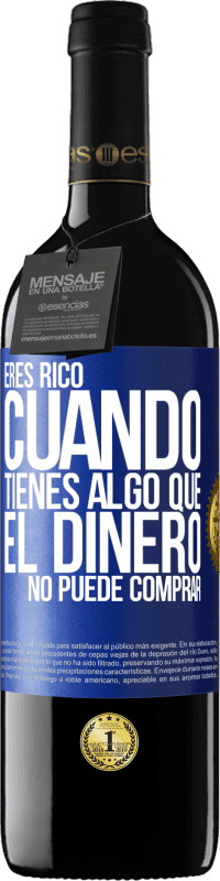 39,95 € Envío gratis | Vino Tinto Edición RED MBE Reserva Eres rico cuando tienes algo que el dinero no puede comprar Etiqueta Azul. Etiqueta personalizable Reserva 12 Meses Cosecha 2015 Tempranillo