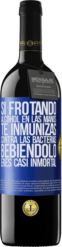 39,95 € Envío gratis | Vino Tinto Edición RED MBE Reserva Si frotando alcohol en las manos te inmunizas contra las bacterias, bebiéndolo eres casi inmortal Etiqueta Azul. Etiqueta personalizable Reserva 12 Meses Cosecha 2015 Tempranillo