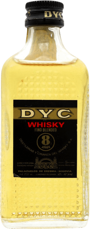 25,95 € Envio grátis | Whisky Blended DYC Espanha 8 Anos Garrafinha Miniatura 5 cl