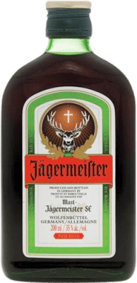 7,95 € Spedizione Gratuita | Liquore alle erbe Mast Jägermeister Germania Piccola Bottiglia 20 cl
