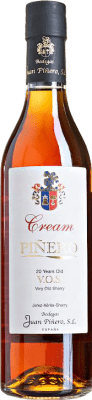 48,95 € Envio grátis | Licor Creme Juan Piñero Cream VOS D.O. Jerez-Xérès-Sherry Andaluzia Espanha Palomino Fino, Pedro Ximénez Garrafa Medium 50 cl