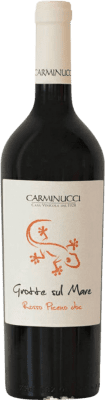 9,95 € Spedizione Gratuita | Vino rosso Carminucci Grotte sul Mare D.O.C. Rosso Piceno Marcas Italia Bottiglia 75 cl