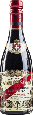 83,95 € Envío gratis | Vinagre Giuseppe Giusti Balsamico Banda Rossa Reserva D.O.C. Modena Italia Botellín 25 cl