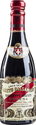 91,95 € Envio grátis | Vinagre Giuseppe Giusti Balsamico Banda Rossa Reserva D.O.C. Modena Itália Garrafa Pequena 25 cl