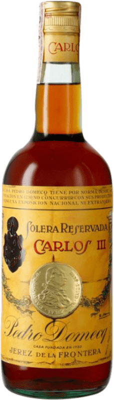 16,95 € Envío gratis | Brandy Pedro Domecq Fundador Carlos III Precinta 4 Pesetas Ejemplar Coleccionista España Botella 1 L