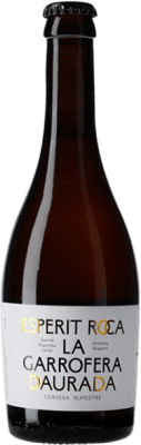 7,95 € Бесплатная доставка | Пиво Esperit Roca Cervesa Rupestre La Garrofera Daurada Испания треть литровая бутылка 33 cl