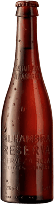 53,95 € Spedizione Gratuita | Scatola da 24 unità Birra Alhambra Roja Riserva Andalusia Spagna Bottiglia Terzo 33 cl