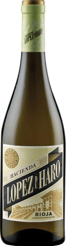 6,95 € Бесплатная доставка | Белое вино Hacienda López de Haro Бочка D.O.Ca. Rioja Ла-Риоха Испания Viura — Виура бутылка 75 cl