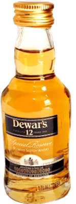 4,95 € Spedizione Gratuita | Whisky Blended Dewar's White Label 12 Anni Bottiglia Miniatura 5 cl