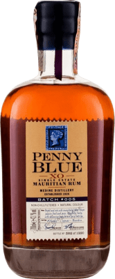 44,95 € Envío gratis | Ron Medine Penny Blue X.O. Extra Old Extra Añejo Mauricio Botella 70 cl