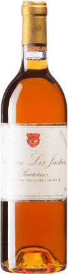 146,95 € Envío gratis | Vino blanco Château Les Justices 1989 A.O.C. Sauternes Burdeos Francia Sémillon, Muscadelle Botella 75 cl